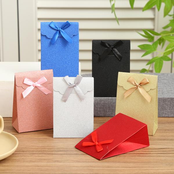 FXY-5604 FUNDA DE REGALO CON BRILLO 7.5*4*10.5CM FXY5604